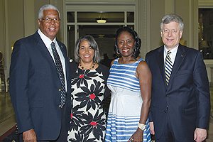 Members of Pitt's African American Alumni Council—(from left) Tony Fountain, Lark Fountain, and Linda Wharton-Boyd—gathered with Pitt Chancellor Mark A. Nordenberg (right) at the June 21 celebration reception.