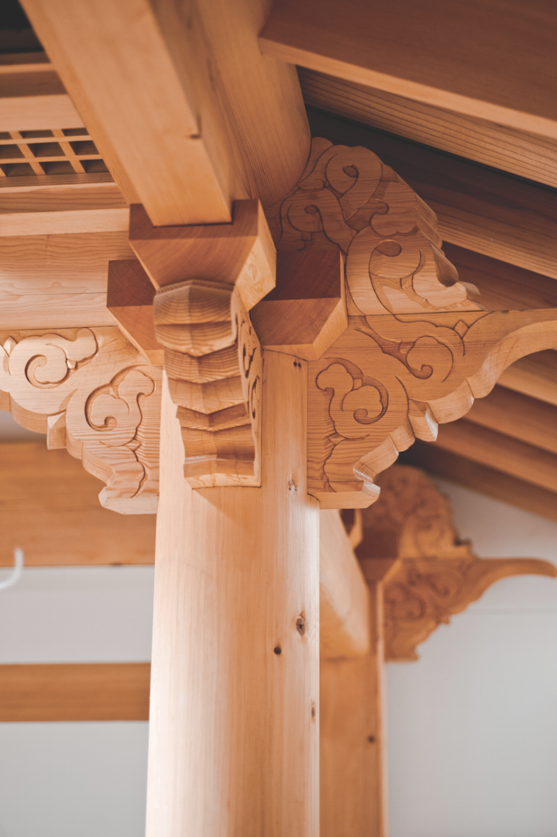 Finely carved woodwork crafted by artisans who specialize in traditional Korean architecture. 