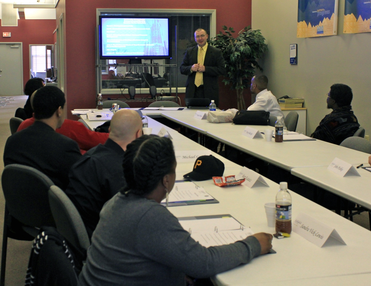 Raymond L. Vargo, director of Pitt’s Small Business Development Center within the Institute for Entrepreneurial Excellence, leads a consulting session at an Advancing Entrepreneurship in the Mon Valley Region workshop. 